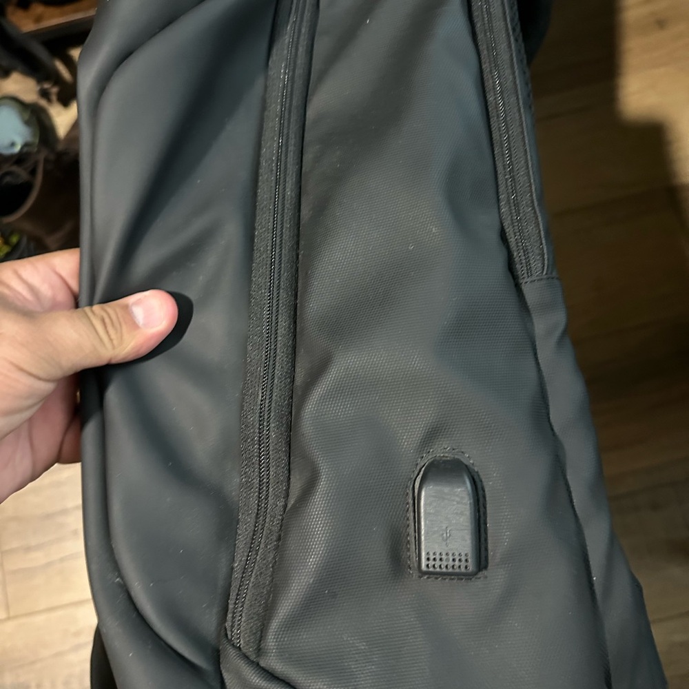 Black Backpack With Modern Design - image 4